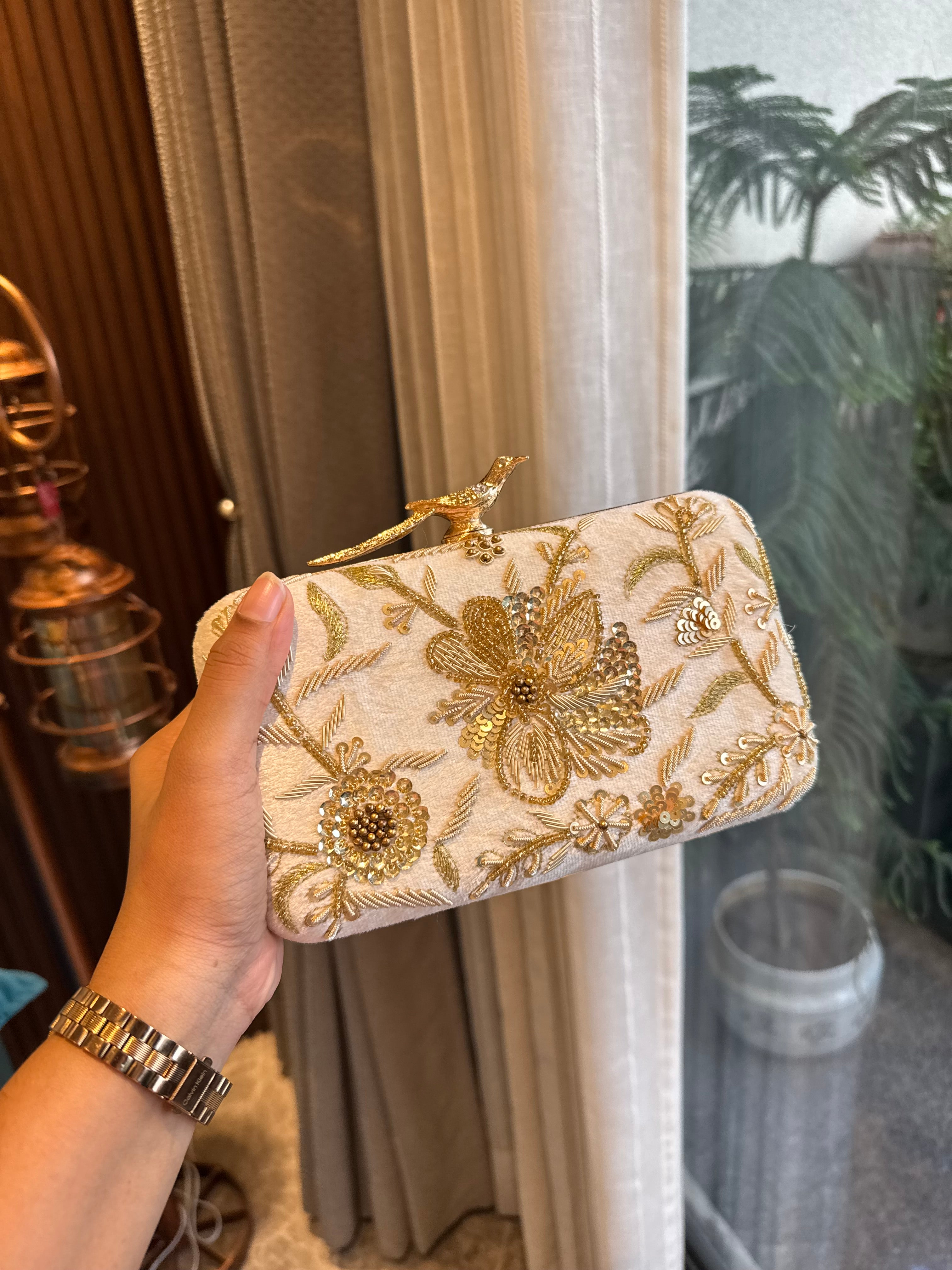 Bird embroidery clutch