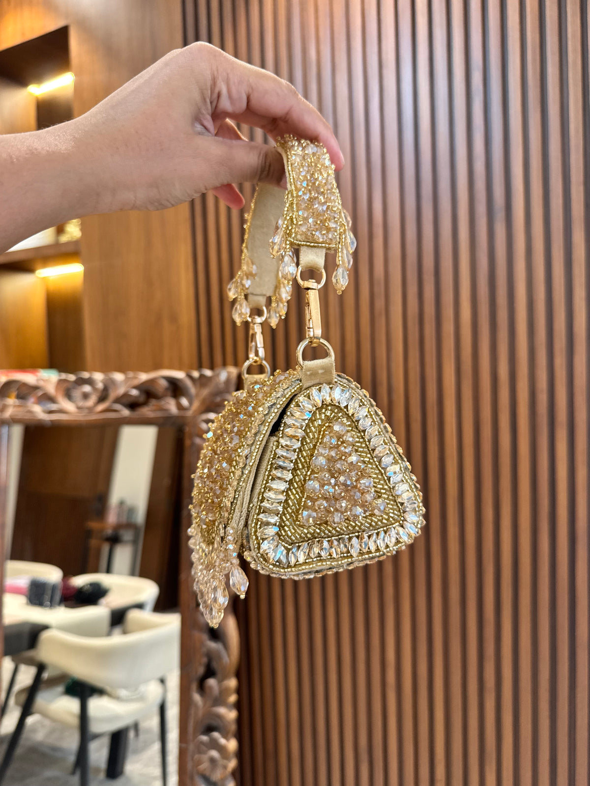 Ruha triangle clutch