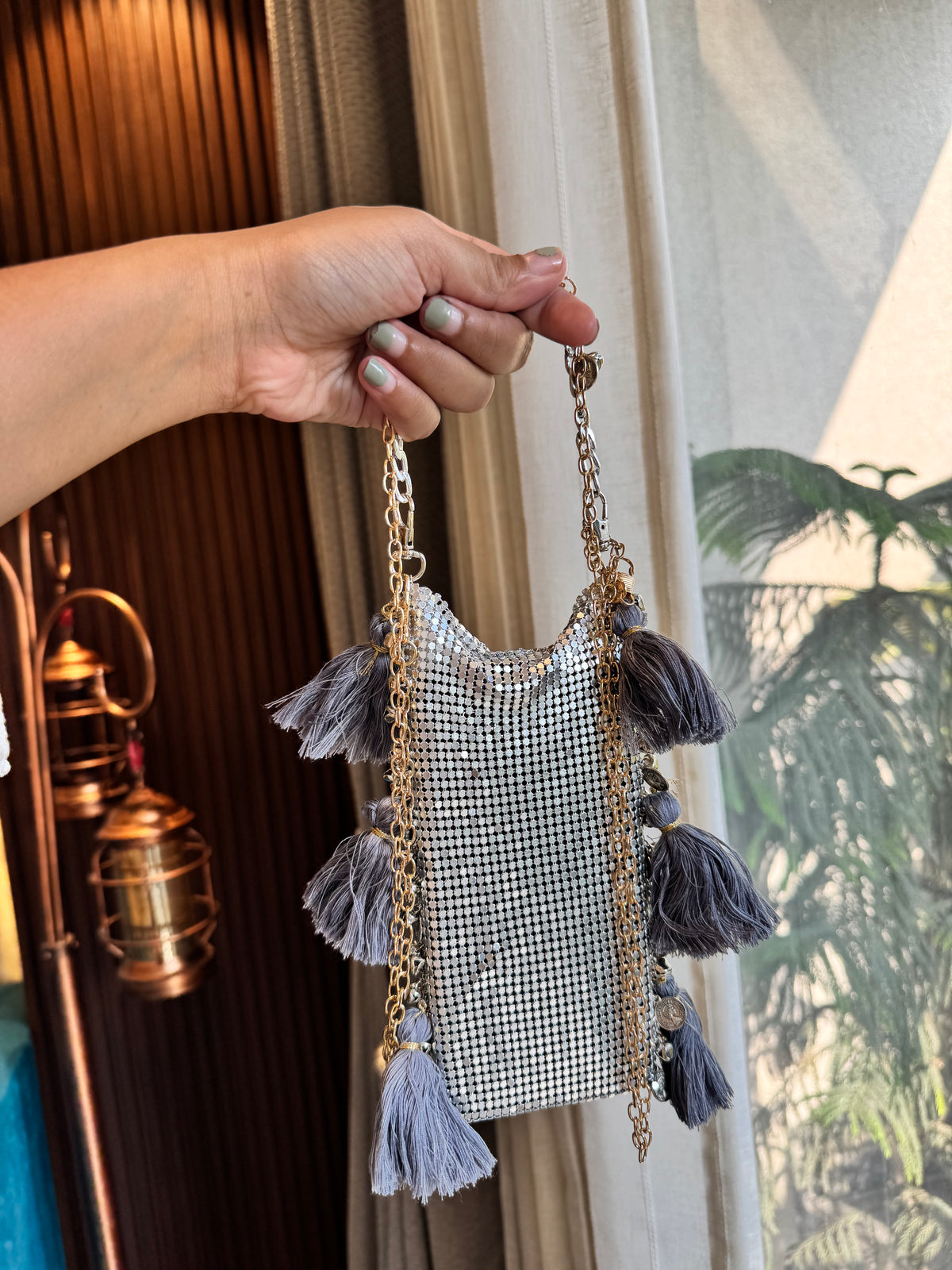 Metalic mobile sling bag