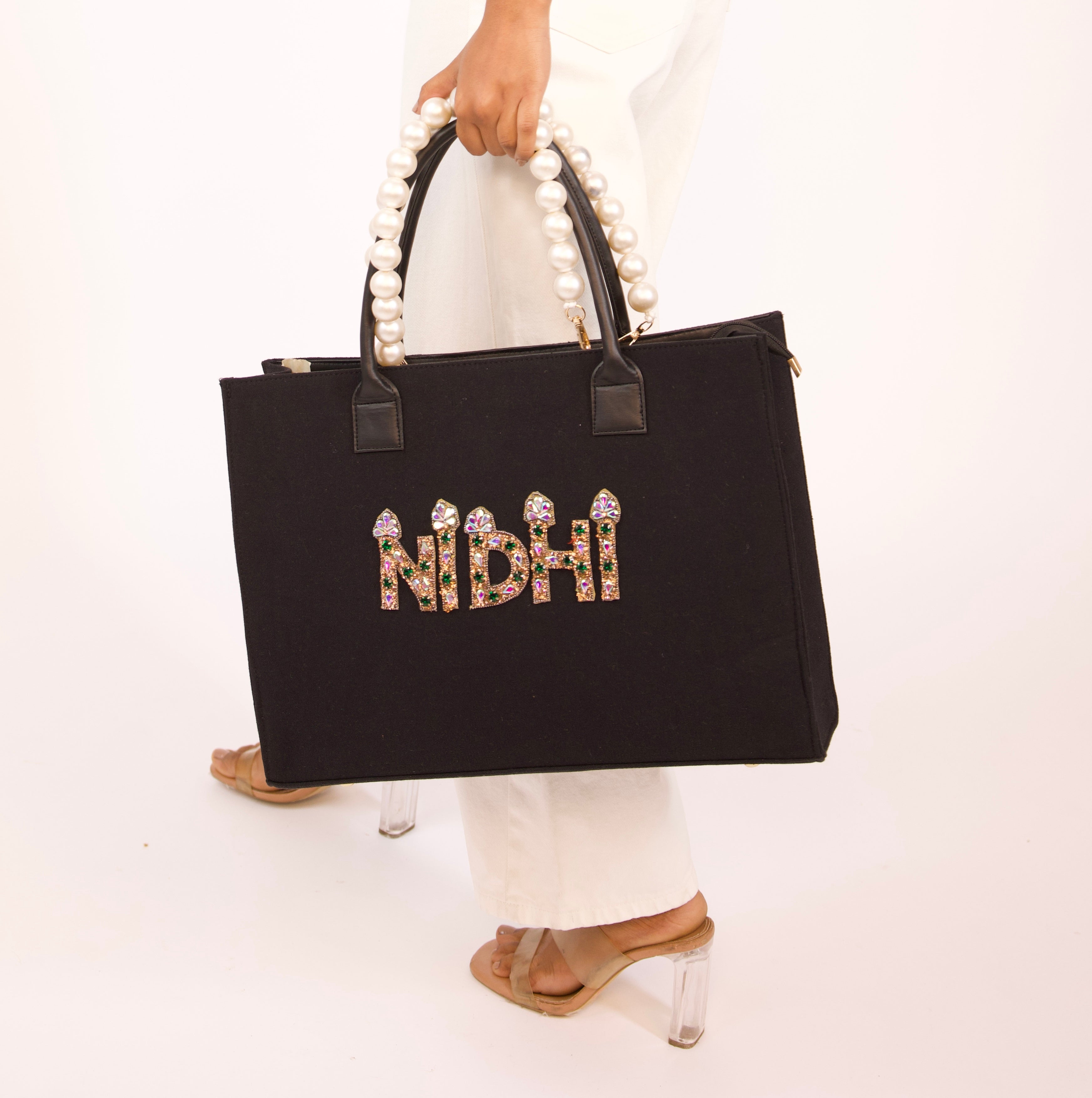 Canvas bag with pearl handle