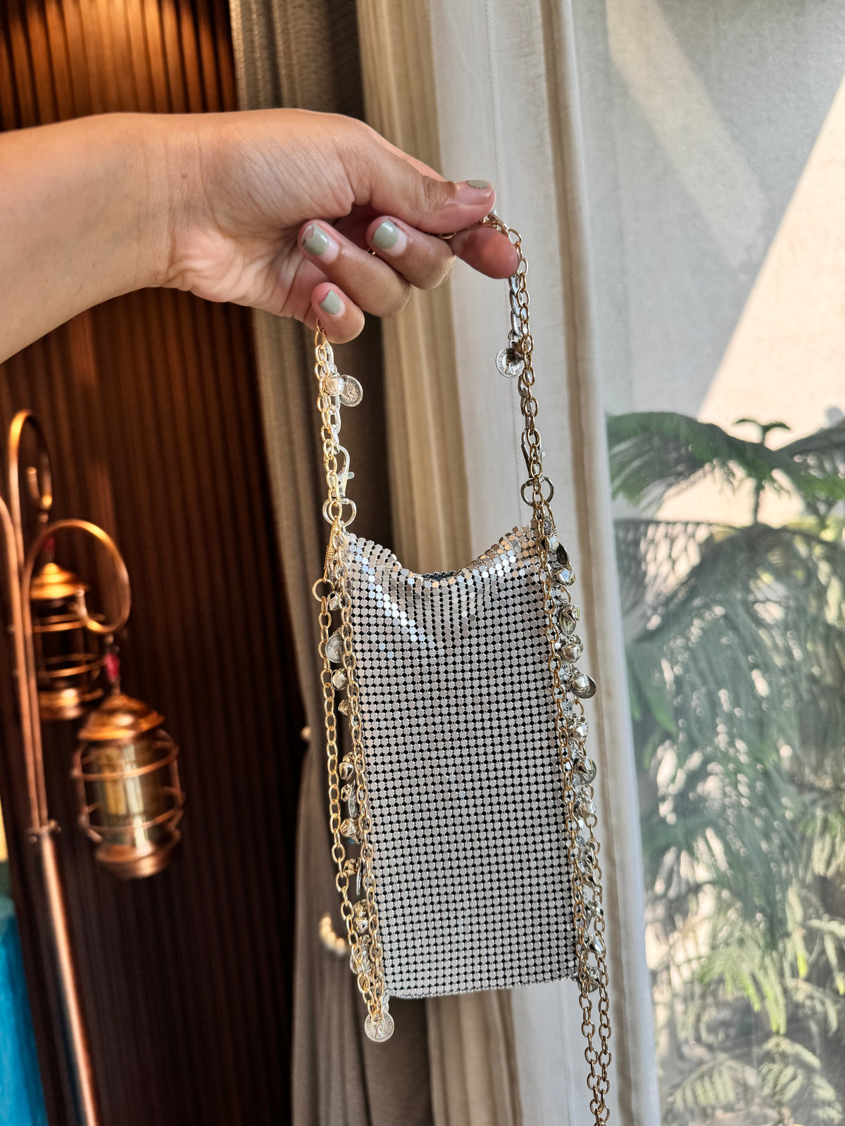 Metalic mobile sling bag