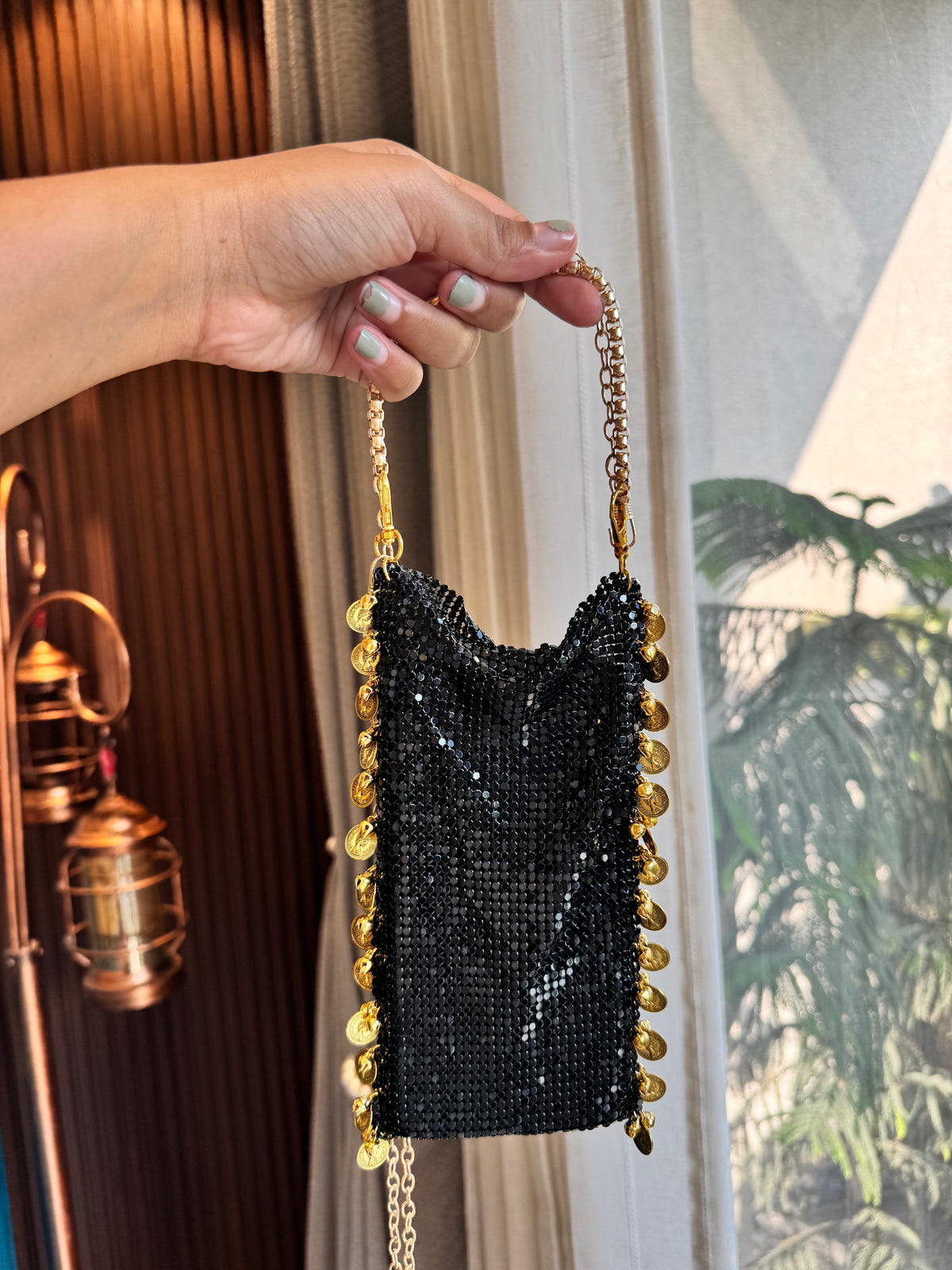 Metalic mobile sling bag