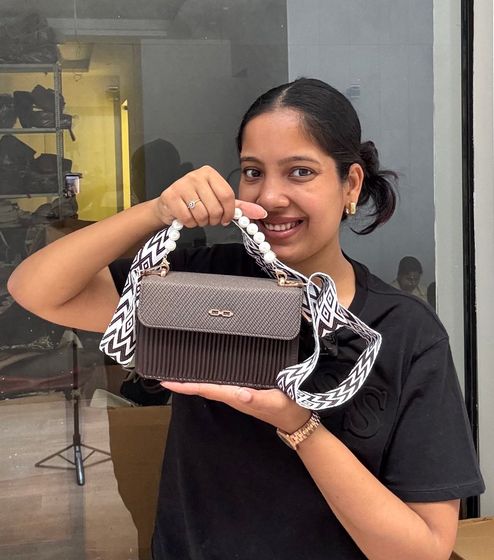 Pearl handle sling bag
