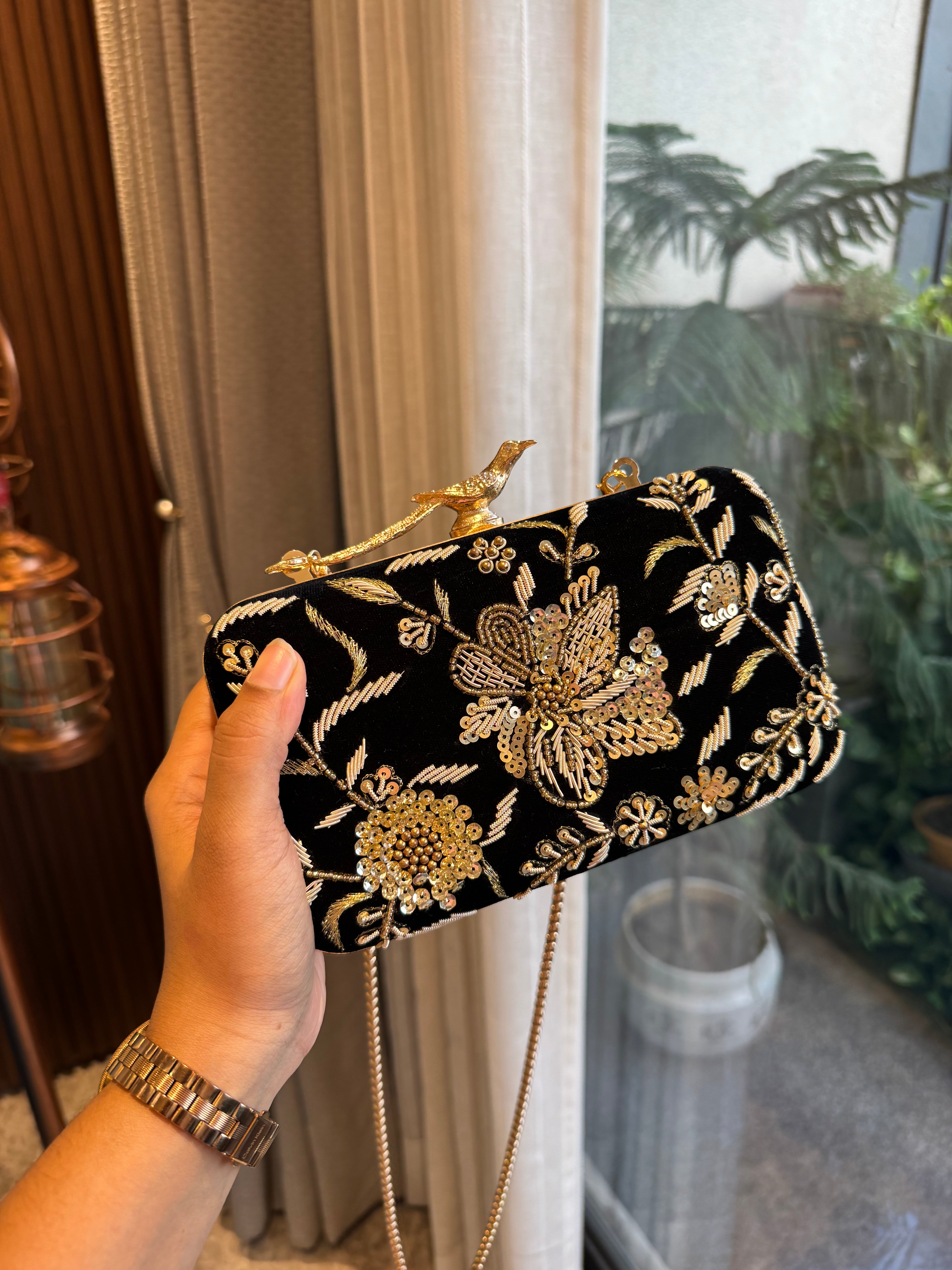 Bird embroidery clutch