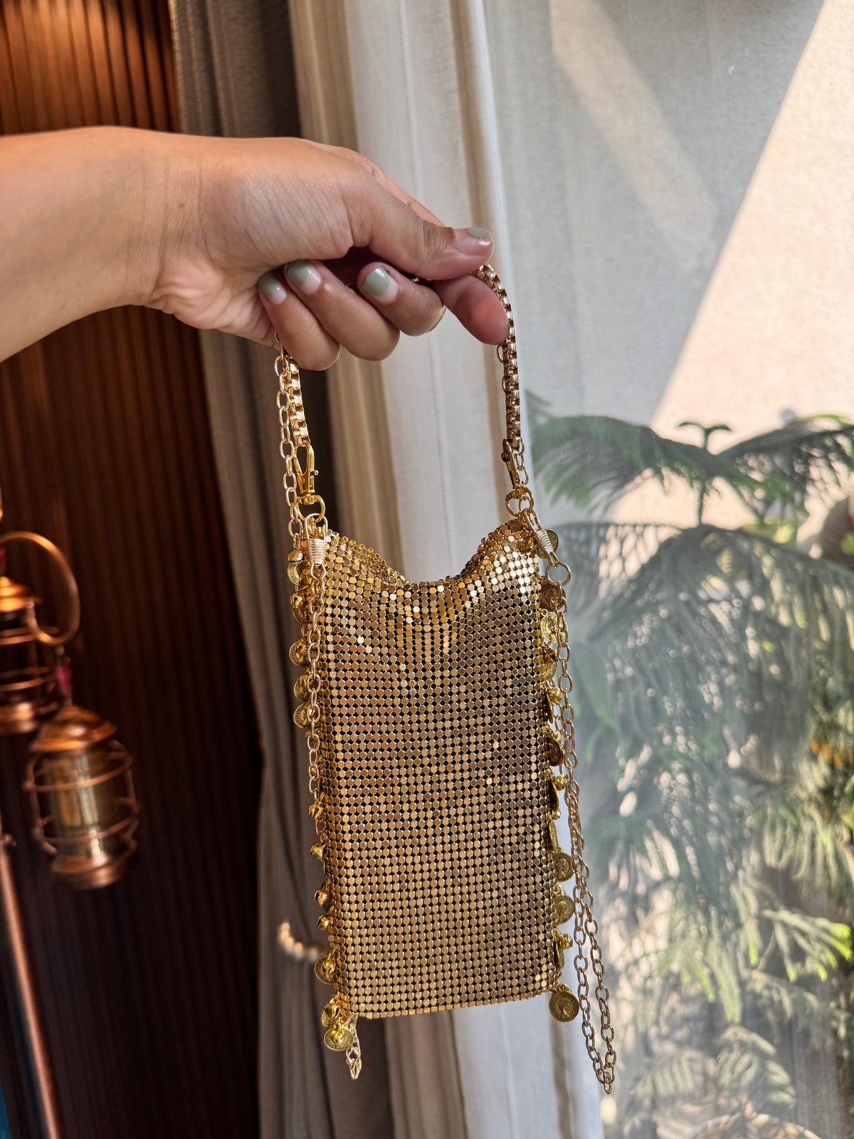 Metalic mobile sling bag