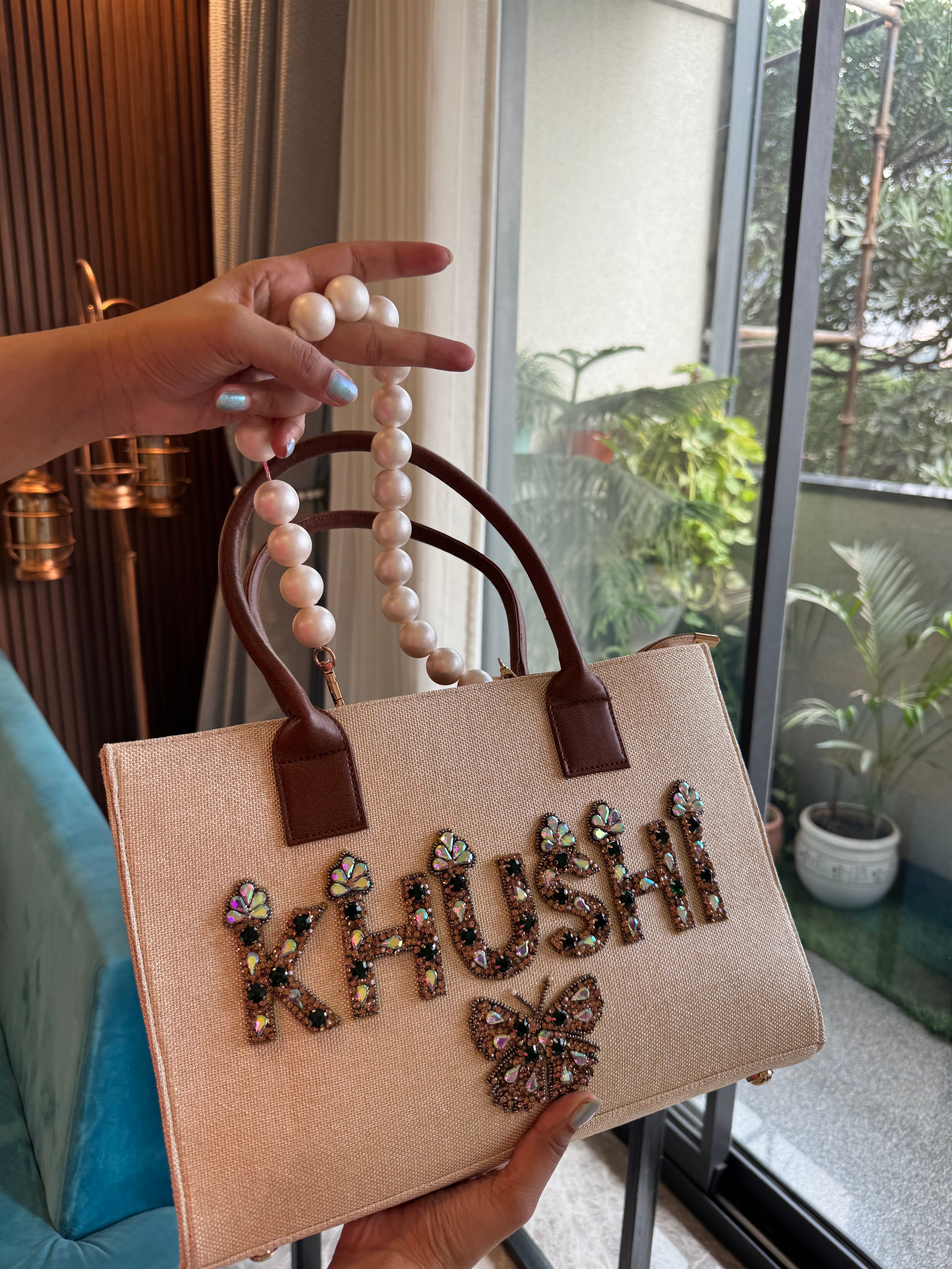 Beige Canvas bag with pearl handle