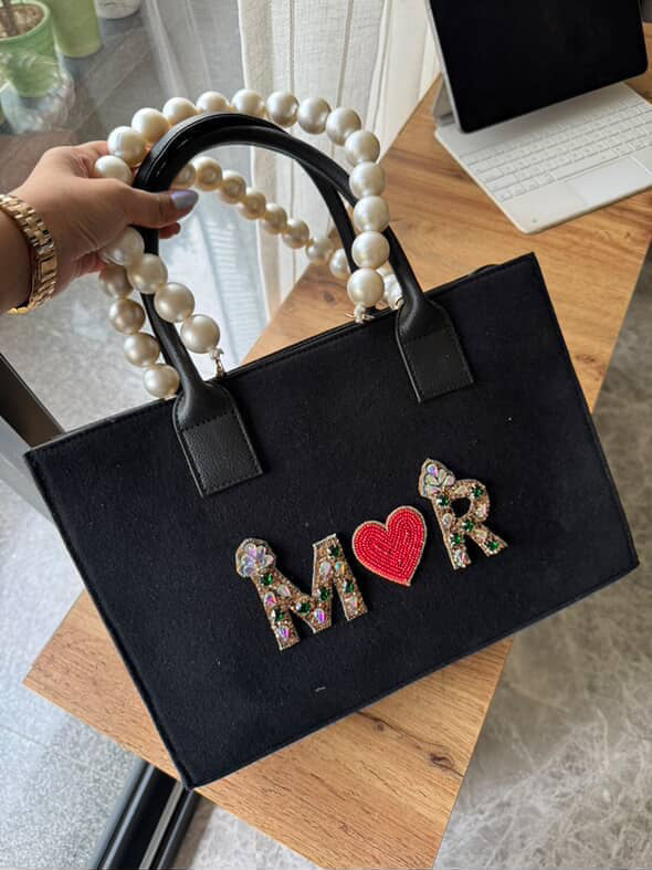 Canvas bag with pearl handle