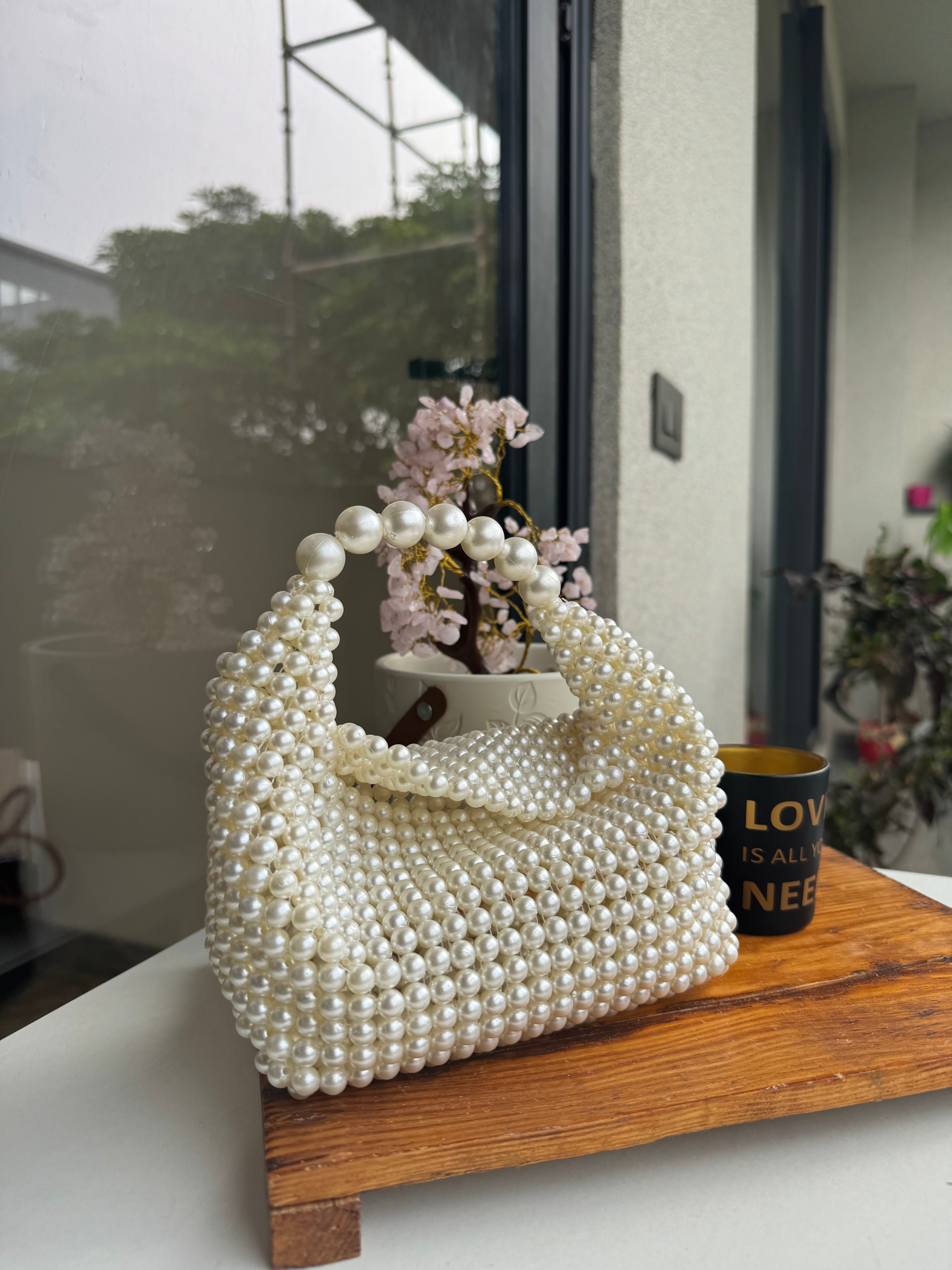 Flap pearl purse