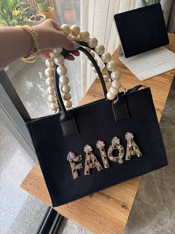 Canvas bag with pearl handle