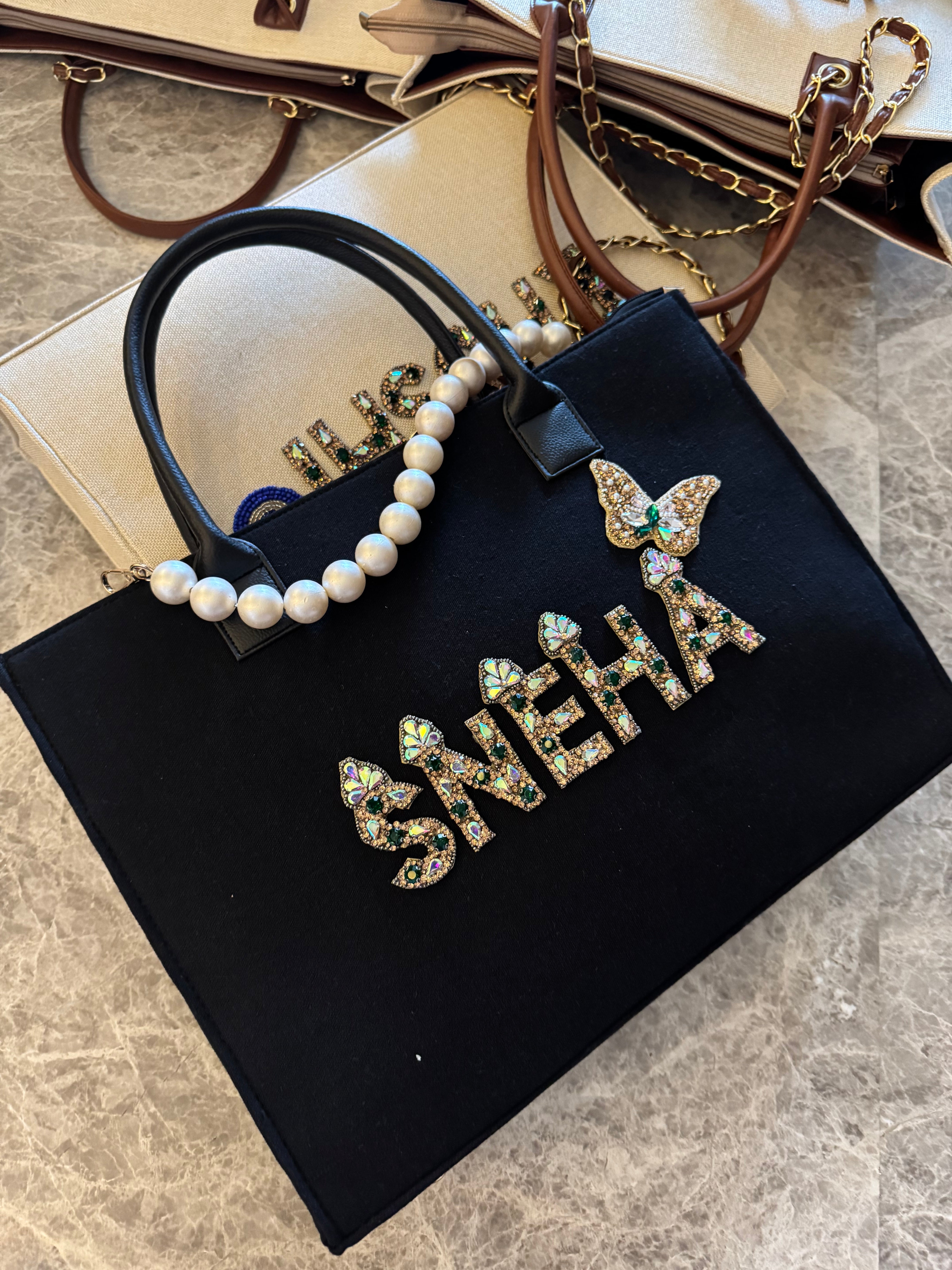 Canvas bag with pearl handle