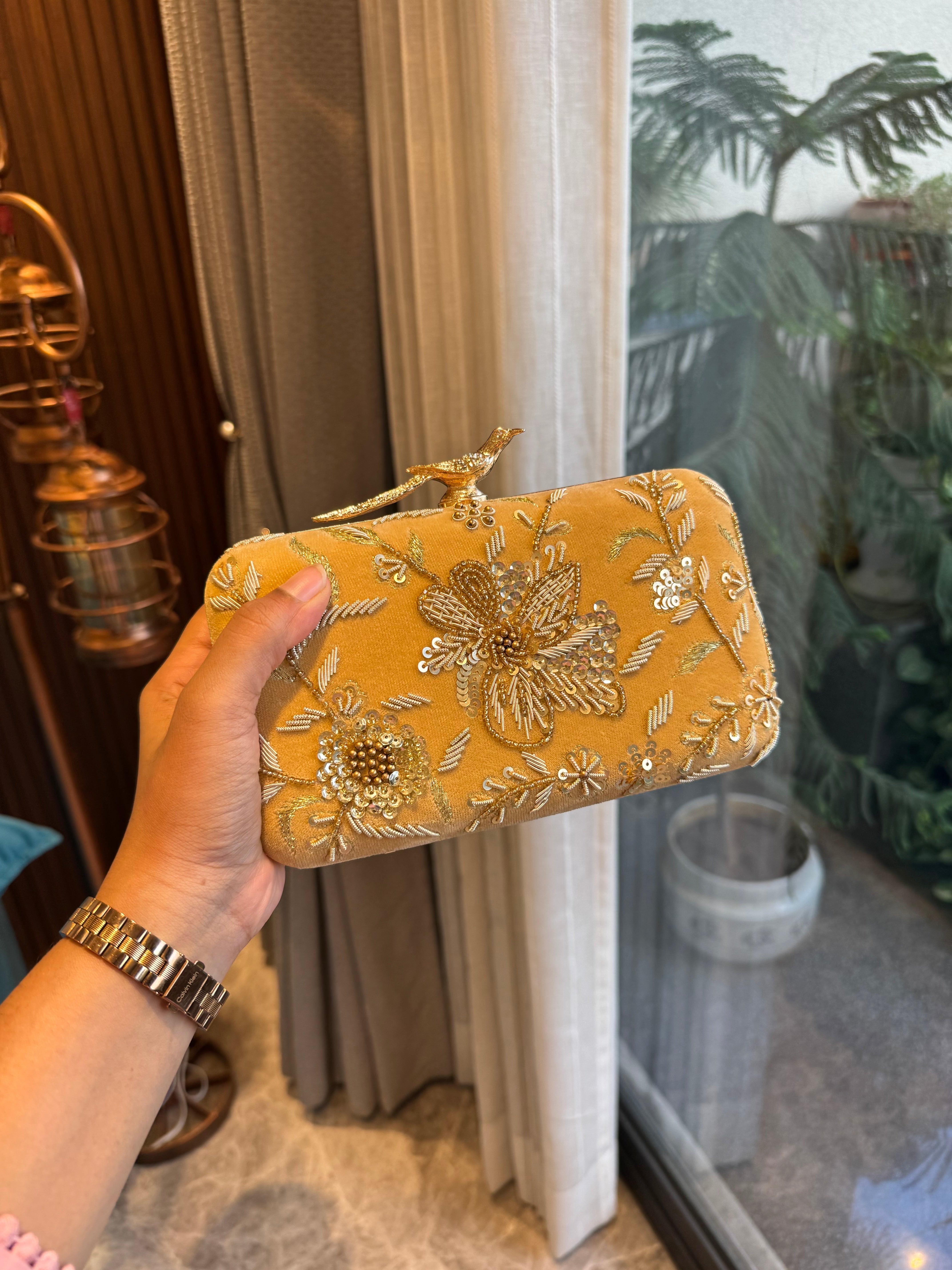 Bird embroidery clutch